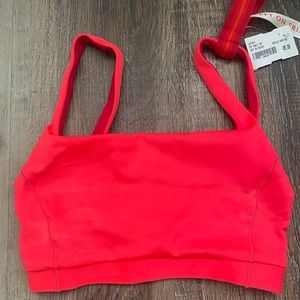 Left on Friday Top Shelf swimsuit top in Rescue (neon coral)